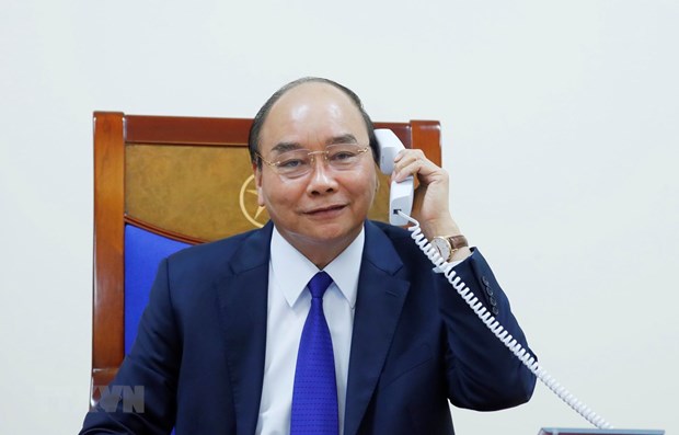 PM Nguyen Xuan Phuc holds phone talks with US President Donald Trump hinh anh 1