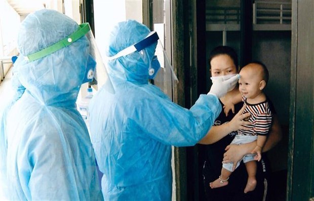 Vietnam believes world will soon put pandemic under control: spokeswoman hinh anh 1