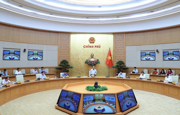 PM chairs meeting on development of key EZs hinh anh 1