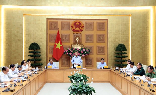 Wage reform must be concurrent with apparatus streamlining: PM hinh anh 1