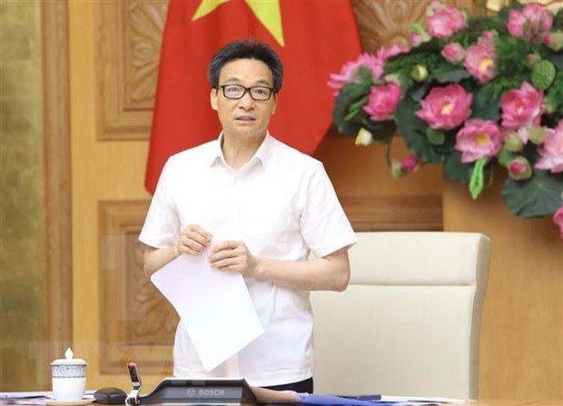 Deputy PM chairs meeting to re-energize pandemic-hit tourism industry hinh anh 1
