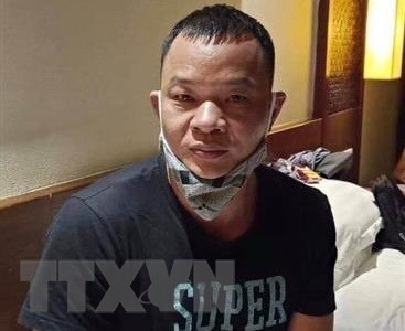 Chinese man arrested for illegally bringing foreigners into Vietnam hinh anh 1