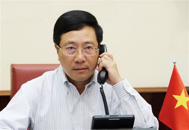Deputy PM Pham Binh Minh holds phone talk with US Secretary of State hinh anh 1