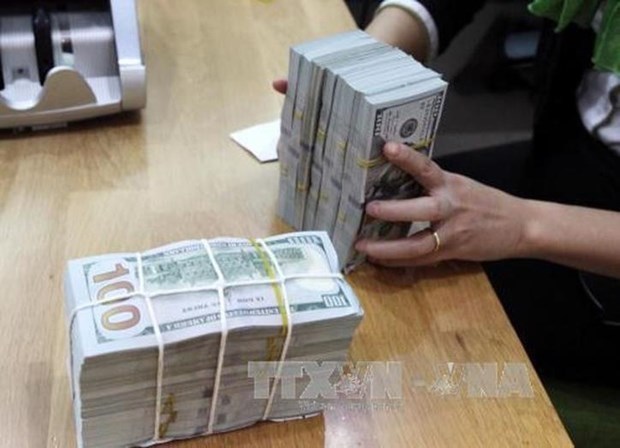 Reference exchange rate up 15 VND at week’s beginning hinh anh 1