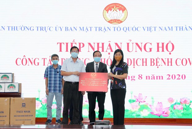 Businesses, organisations lend support to Hanoi in COVID-19 fight hinh anh 1