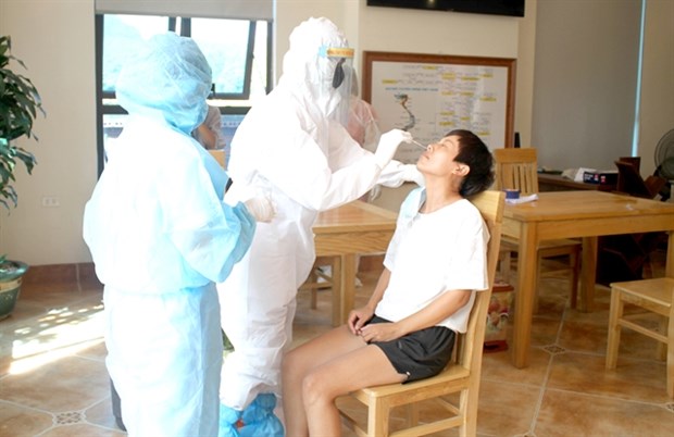 Quarantine waived for foreigners entering on short-term diplomatic, business trips hinh anh 1