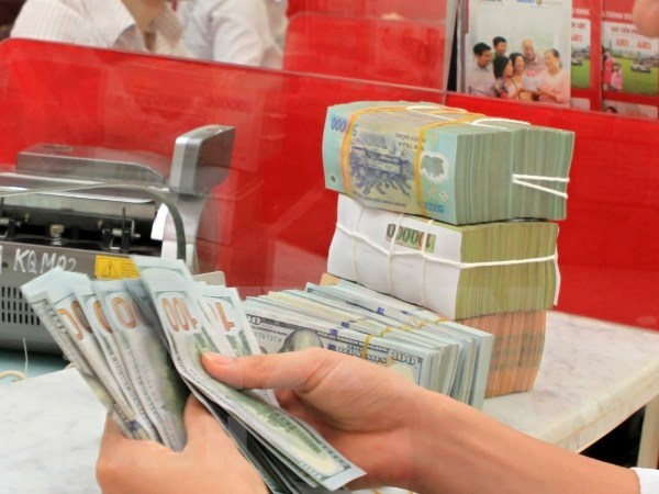 Reference exchange rate down 4 VND on October 6 hinh anh 1