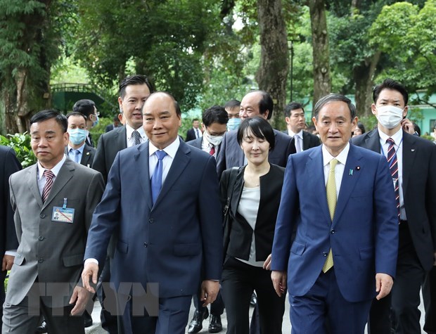 Japanese news agency spotlights PM Suga Yoshihide’s Vietnam visit hinh anh 1