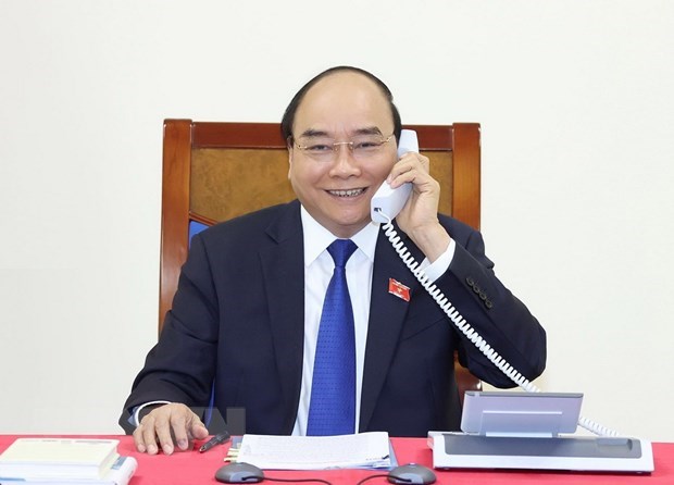 PM holds phone talks with Thai counterpart hinh anh 1