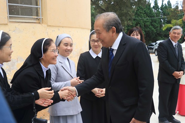 Deputy PM pays Christmas visits to Da Lat Diocese, Evangelical Church hinh anh 1