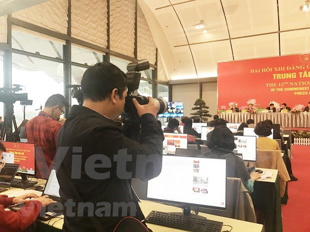 More than 200 media outlets to cover 13th National Party Congress at the scene hinh anh 7