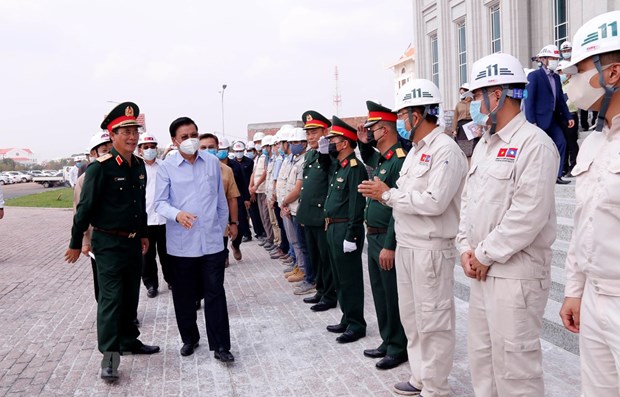 Lao leader pleased with quality, progress of Vietnamese-funded NA building hinh anh 1
