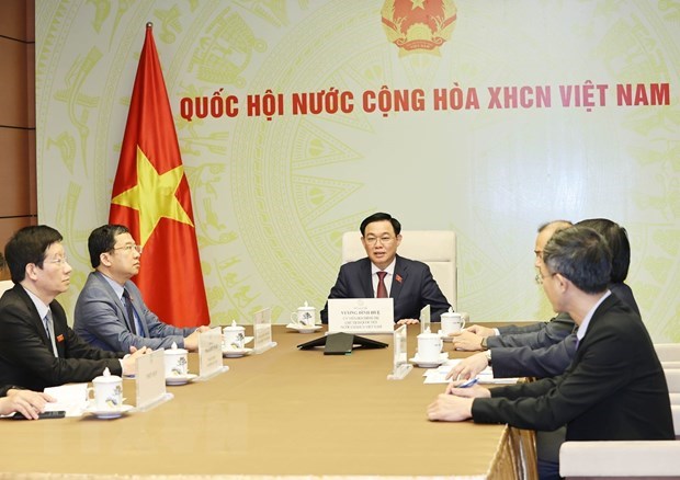 Top legislator holds phone talks with Lao counterpart hinh anh 2