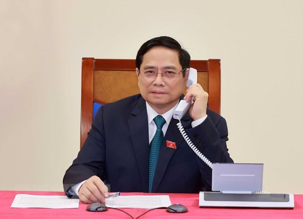 Lao Prime Minister makes phone call to congratulate Vietnamese counterpart hinh anh 1