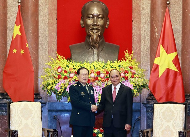 Armies’ successful ties help reinforce Vietnam-China relations: President hinh anh 2