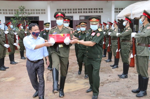 Vientiane ceremony marks repatriation of Vietnamese martyrs’ remains hinh anh 1