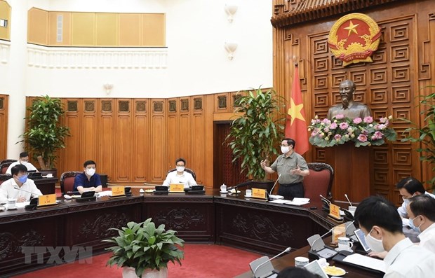 Personal, collective resonsibility on COVID-19 spread must be made clear: PM hinh anh 1