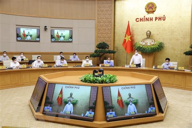 Prime Minister Pham Minh Chinh chairs first regular Government meeting hinh anh 2