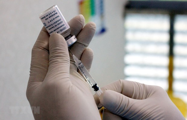 Hanoi to offer free COVID-19 vaccinations to residents aged 18-65 hinh anh 1