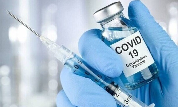COVID-19 vaccines approved for use in Vietnam go through three clinical trial phases: ministry hinh anh 1