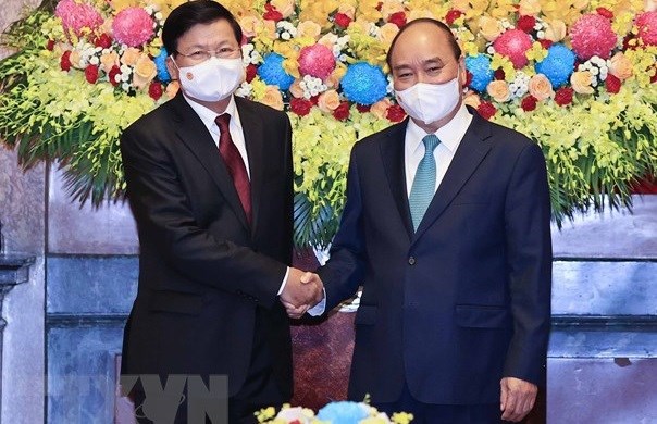 Top Lao leader’s Vietnam visit – historical milestone in bilateral ties hinh anh 1