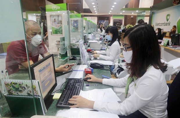 Banks agree to cut lending rates to support hard-hit businesses hinh anh 1