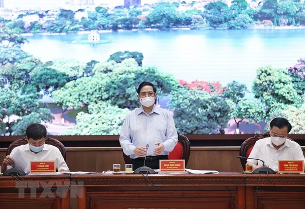 PM asks Hanoi to put people’s health first and foremost hinh anh 1