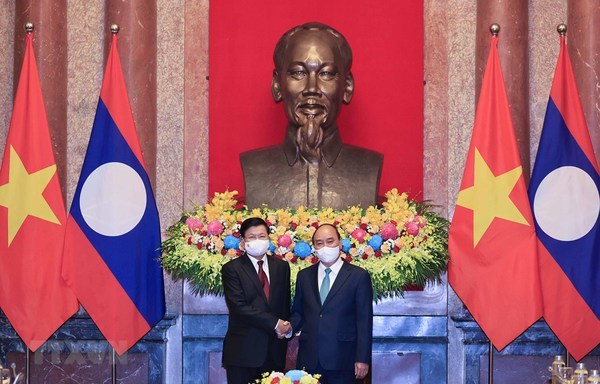 President’s visit affirms special attention to fostering ties with Laos hinh anh 1