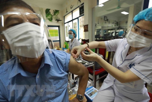 Vietnam records 9,340 new COVID-19 cases on August 9 hinh anh 1