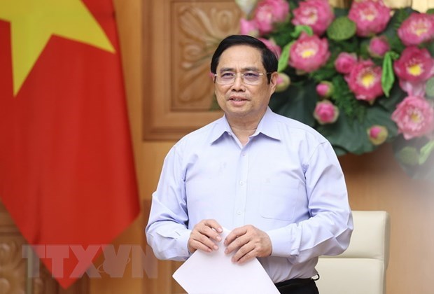 Vietnam hopes to receive more US support in COVID-19 combat: PM hinh anh 1