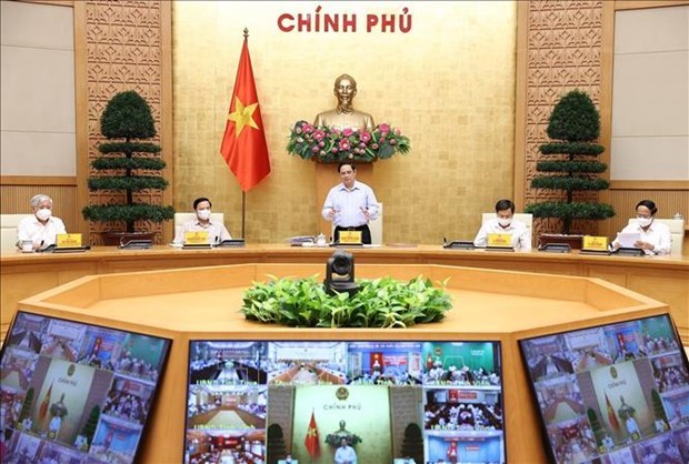 PM chairs national teleconference on COVID-19 prevention and control hinh anh 2