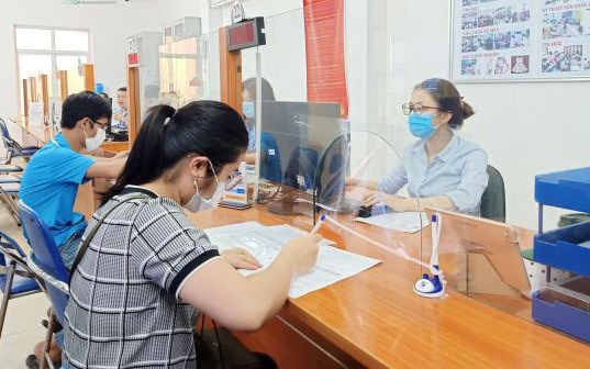 More than 2.6 million workers in HCM City benefit from social insurance policy hinh anh 1