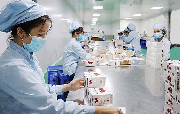 Hanoi’s COVID-19-free zones strive to bolster production hinh anh 1