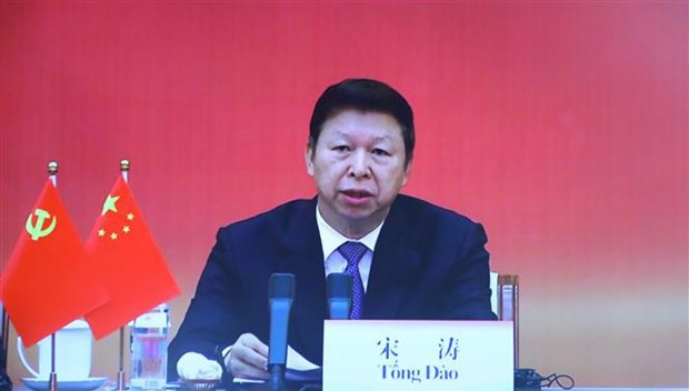 Vietnam, China share experience in Party building hinh anh 3
