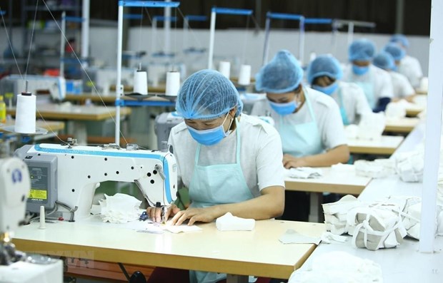 Hanoi-based businesses speed up production, export hinh anh 1