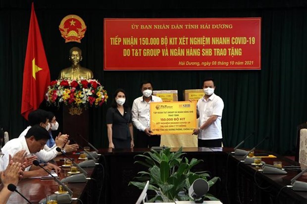 Businesses donate 150,000 COVID-19 rapid test kits to Hai Duong hinh anh 1