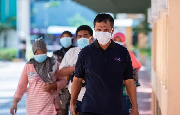 Indonesia prepares roadmap for “new normal,” conditioned by herd immunity hinh anh 1