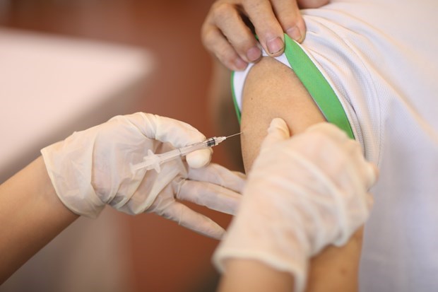 COVID-19 vaccination now covers children aged 12 - 17: MoH hinh anh 1