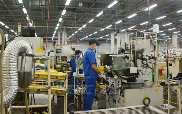 HCM City: 230,000 workers return to factories hinh anh 1