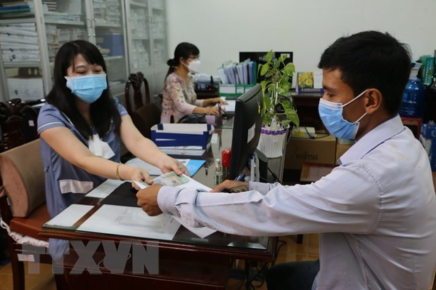 Hanoi helps pandemic-hit people with over 3 trillion VND hinh anh 1