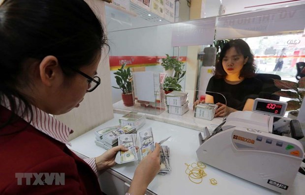 Reference exchange rate up 9 VND at week’s beginning hinh anh 1