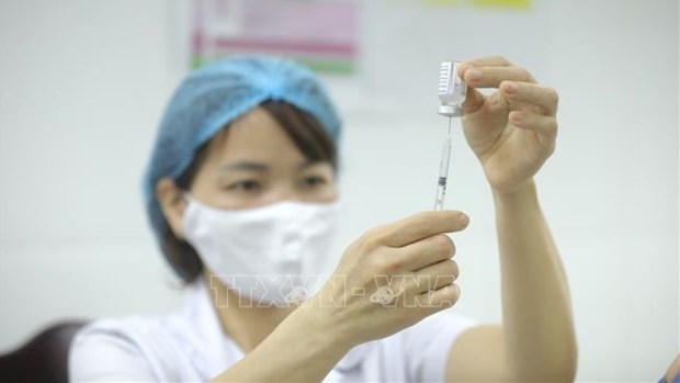 Hanoi’s vaccination drive eyes over 95 percent of children aged 12 - 17 hinh anh 1