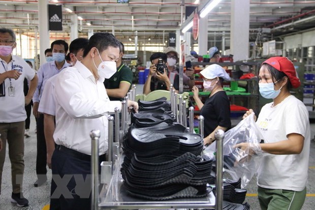 HCM City: Over 38,000 workers at Pouyuen Vietnam return to work hinh anh 1