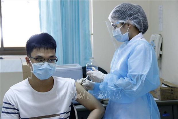 COVID-19: Laos vaccinates children, Thailand prepares vaccines for 2022 hinh anh 1