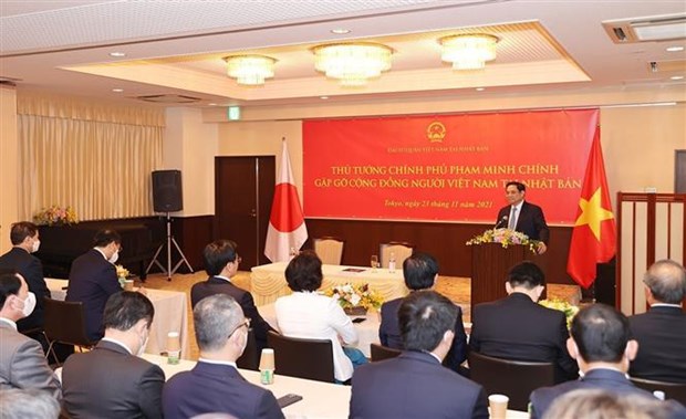 Prime Minister Pham Minh Chinh meets Vietnamese community in Japan hinh anh 1