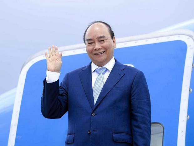 President Nguyen Xuan Phuc leaves for official visits to Switzerland, Russia hinh anh 1