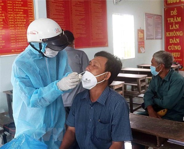 Vietnam records additional 13,063 COVID-19 cases hinh anh 1