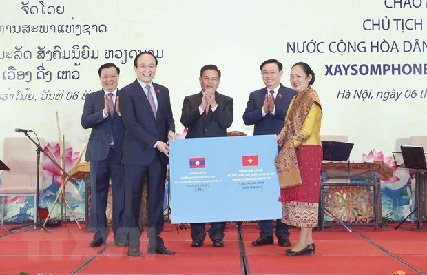 Banquet for Lao NA President held hinh anh 1