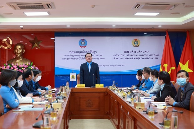 Vietnam, Laos forge trade union cooperation hinh anh 1