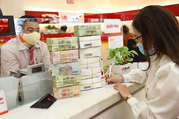 Reference exchange rate up 32 VND at week’s beginning hinh anh 1